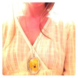 Spring pansy floral botanical terrarium necklace.